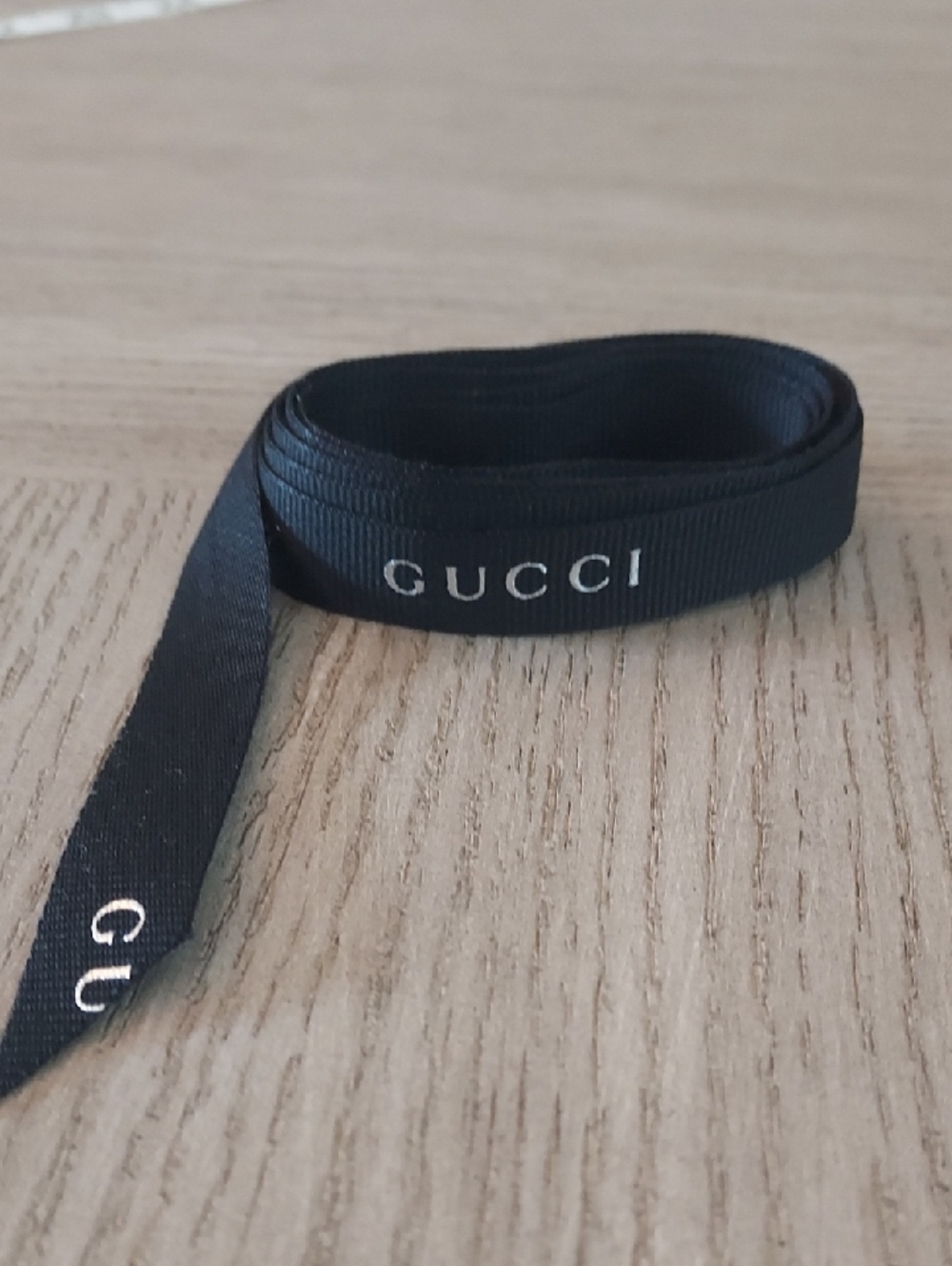 Gucci Black Ribbon with White Logo